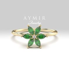 Emerald and Diamond Ring, Dainty Emerald Ring, Minimalist Gold Ring, Flower Emerald Ring, May Birthstone Ring, Birthday Gifts, Gift For Her ♦ If you want this ring with color gemstones, please send us a message, and we will quote you a price with your desired stones. ♥ ♦ Ring Features ♦ ▸ Made to Order ▸ Available Gold Color: Yellow Gold, Rose Gold, White Gold ▸ Band Width: 1.20mm ▸ Material: Solid Real Gold (not gold-filled or no gold plated) ▸ Available Gold Carat: 8K - 333, 14K - 585, 18K - 7 Flower Emerald Ring, Gold Ring Flower Design, Emerald Flower Ring, Fine Jewelry Flower Ring For May Birthstone, Flower Shaped Ring With May Birthstone For Wedding, Flower Shaped May Birthstone Rings For Wedding, Flower-shaped May Birthstone Rings For Wedding, Flower-shaped May Birthstone Wedding Rings, Elegant Flower Shaped Emerald Ring For Gift