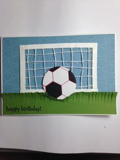 a card with a soccer ball in the goal and happy birthday written on it's side