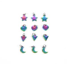 Find the Oil Slick Shapes Charm Set by Bead Landing™ at Michaels. This fun charm set from Bead Landing will add a playful touch of magic to your accessory creations. Featuring a mix of shapes with a shimmery oil slick finish, these charms will make a great addition to a chain bracelet or necklace or use to make cute mismatched pairs of dangly earrings. This fun charm set from Bead Landing will add a playful touch of magic to your accessory creations. Featuring a mix of shapes with a shimmery oil Bead Landing, Now Oils, Michael Art, Oil Slick, Jewelry Making Charms, Dangly Earrings, Charm Set, Bead Crafts, Charm Jewelry