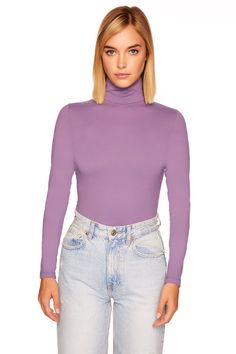 86% nylon 14% spandex machine washable models are 5’11” wearing size XS Turtleneck Long Sleeve, Turtleneck Top, Long Sleeve Turtleneck, Turtle Neck Top, Fitted Silhouette, A Skirt, Polished Look, Plum, Turtle Neck