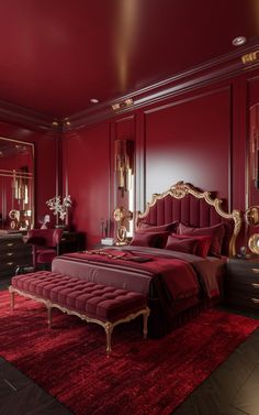 a bedroom with red walls and gold accents