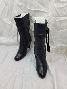 So cute fashionable women's boots for special lady's. Black leather vintage boots 90's.  These beautiful boots with a skirt or dress look very nice. Soft leather made this shoes very comfortable.  There vintage boots complete any look you have. This boots very well. In a single copy. High heel. Custom shoes, vintage knee high boots very like. 90's fashion. High heel boots are always elegant shoes. This renaissance boots is a vintage supply. The original style of the 90's. Limited edition. Good c Retro Leather Heeled Boots With Wide Calf, Retro Wide Calf Leather Heeled Boots, Retro Knee-high Winter Boots With Round Toe, Retro Knee-high Boots With Round Toe For Winter, Leather Platform Boots For Cosplay In Fall, Retro Winter Knee-high Boots With Round Toe, Fall Leather Platform Boots For Cosplay, Fitted Leather Mid-calf Heeled Boots, Leather Moto Boots For Cosplay And Winter