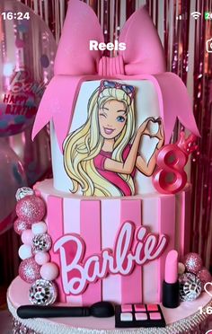 a barbie doll birthday cake with pink decorations