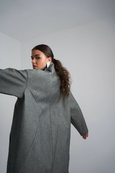 Step up your fashion game with our latest denim oversized midi coat, the perfect addition to any fashion-forward wardrobe.This stunning coat is the perfect combination of classic and modern style. The denim material provides a traditional look but with the oversized shape and midi length, this coat is anything but ordinary.Made from high-quality materials, the denim oversized midi coat is both durable and comfortable. The fabric is soft and easy to wear, while the oversized shape ensures that yo Oversized Chic Wool Coat For Fall, Chic Oversized Wool Coat For Fall, Modern Oversized Outerwear For Everyday, Chic Oversized Single Breasted Outerwear, Chic Oversized Single-breasted Outerwear, Oversized Gray Long Sleeve Wool Coat, Oversized Gray Wool Coat With Long Sleeves, Oversized Trendy Winter Pea Coat, Modern Relaxed Fit Outerwear For Fall