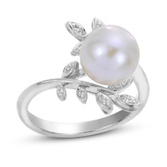 A stunning freshwater cultured pearl is orbited by shimmering accents of natural white topaz gemstones in this exquisite women's ring, crafted in lustrous sterling silver. Silver Akoya Pearl Rings With Diamond Accents, Silver Pearl Rings With Diamond Accents, Silver Rings With Diamond Accents And Pearl, Silver Pearl Ring With Center Stone Fine Jewelry, Fine Jewelry Silver Pearl Ring With Center Stone, Fine Jewelry Sterling Silver Pearl Ring With Diamond Accents, Sterling Silver Pearl Ring With Diamond Accents, Fine Jewelry Silver Pearl Ring With Diamond Accents, White Pearl Ring