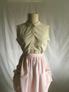 "vintage 1950s women's blouse pdacron polyester/combed cotton blend broadcloth breast darts button up pointed flat collar off white color  straight hem 2 1/2\" side slits good vintage condition, light wear-light pilling no size tag- see below measures, lying flat, shoulder-16\" chest-20 1/2\" hem-20 1/2\" length-24\"" 1950s Woman, Pointed Flat Collar, Mid Century Fashion, Flat Collar, White Sleeveless, Off White Color, Costume Design, Vintage 1950s, Vintage Tops