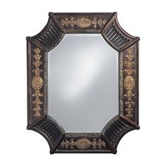 an ornate mirror is shown against a white background