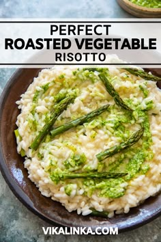 a plate with risotto and asparagus on it