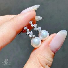 Highline: Elegant Style Product Information OriginJapan MaterialAkoya Pearl, 18k Gold, and Diamond DimensionsEarrings Length Approx. 2.0 cm Pearl Shaped: Round Size: 8-8.5 mm Quality: AAA Nacre: Very Thick Color: White Luster: Aurora Accessories Metal: 18k White Gold Other: 0.45 ct of SI Quality Natural Diamond Luxury Platinum Pearl Earrings For Formal Occasions, Luxury Platinum Pearl Earrings, Luxury Platinum Pearl Earrings For Wedding, Elegant Round Platinum Pearl Earrings, Exquisite White Platinum Earrings, Elegant White Platinum Bridal Earrings, Luxury White Diamond Platinum Earrings, Luxury White Platinum Diamond Earrings, Anniversary White Gold Platinum Pearl Earrings