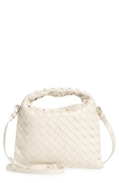 This slightly slouchy hobo bag in a scaled-down silhouette for just the essentials is handwoven in the label's iconic Intrecciato style from soft calfskin. Magnetic closure Top carry handle; removable, adjustable crossbody strap Interior zip pocket Calfskin-leather lining Leather Made in Italy Designer Handbags White Rectangular Bag With Intrecciato Weave, Modern Woven Leather Hobo Bag With Double Handle, White Hobo Bag With Top Carry Handle For Errands, White Hobo Bag For Errands With Top Carry Handle, White Hobo Bag For Errands, White Intrecciato Weave Bag For Travel, Modern Double Handle Woven Leather Hobo Bag, White Intrecciato Weave Travel Bag, Luxury Cream Shoulder Bag With Intrecciato Weave