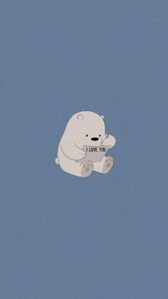 a white teddy bear flying in the sky with i love you written on its chest