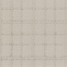 a beige and white checkered wallpaper with small squares in the middle, on top of a plain surface