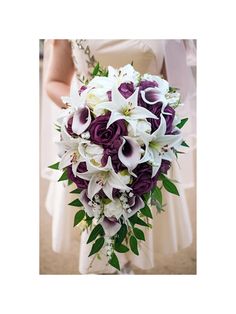 a bridal bouquet with purple and white flowers