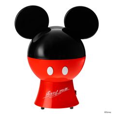 the mickey mouse lamp is red and black with white dots on it's ears