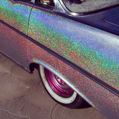 an old car with holographic paint on it