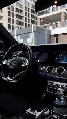 the interior of a mercedes benz s - class sedan with its dashboard and infotain