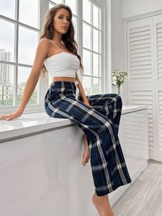 Elevate your relaxation game with our Plaid Print Sleep Pants. Embrace comfort in style with bow-front details. Crafted from premium 100% polyester fabric for a luxurious feel. Perfectly tailored in a regular fit, these long pajama bottoms exude timeless charm. Effortlessly machine wash or professionally dry clean. Discover a new level of evening bliss. Features: Pattern Type: Plaid Details: Bow Front, Bow Type: Pajama Bottoms Length: Long Fit Type: Regular Fit Fabric: Non-Stretch Material: Fabr Casual Wide-leg Pants For Pajama Party, Casual Sleep Trousers, Casual Wide Leg Pants For Pajama Party, Casual Wide-leg Sleep Bottoms, Casual Wide-leg Sleep Pants, Wide-leg Sleep Pants, Casual Fitted Bottoms For Pajama Party, Chic Long Pants For Pajama Party, Pj Pants Outfit