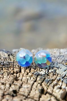 ♥ Back to the beach collection ♥ Feel the beach even when you are far away. ★ Tiny Waves stud earrings ★ Have a tiny piece of the beach with you at all times. These glass orb earrings are filled with miniature seashells, real sand and/or sea glass from the Slovenian beach. The items inside move around. Glass ball measures just 0.39 in x 0.39 in (10mm x 10mm). Nickel-free Ocean-inspired Earrings For Gift, Ocean-inspired Hypoallergenic Jewelry As A Gift, Ocean-inspired Hypoallergenic Jewelry Gift, Ocean-inspired Drop Earrings For Gifts, Ocean-inspired Drop Earrings Gift, Ocean-inspired Drop Earrings For Gift, Turquoise Jewelry Gift, Personalized Blue Earrings For Gift, Fun Round Earrings As A Gift