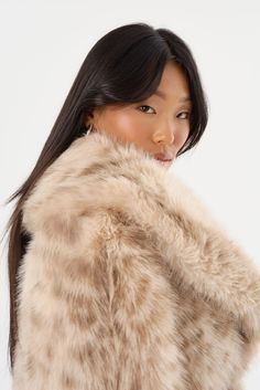 The DANIKA Faux Fur Jacket, featuring a plush leopard print, brings all the glamour and trendiness you need for fall. The large shawl collar exudes elegance, while the front hook-and-eye closure ensures a secure fit. This statement piece pairs beautifully with high-waisted trousers for a chic daytime ensemble, or over an evening dress for a polished and eye-catching look. Swim Accessories, Dress Accessories, Skirt Pants