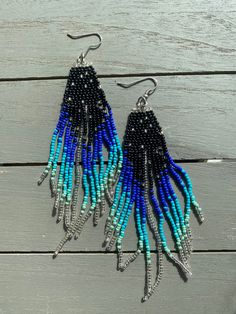 Blue Beaded Fringe Tassel style Earrings FREE SHIPPING IN USA  **A portion of every sale will directly benefit homeless women in the ATX community. Thank you for choosing SoyJuju! Check out our store for more colors Traditional Blue Beaded Fringe Earrings, Blue Beaded Fringe Earrings For Festival, Bohemian Blue Earrings With Beaded Fringe, Blue Bohemian Beaded Fringe Earrings, Bohemian Blue Beaded Fringe Earrings, Bohemian Blue Beaded Earrings With Tiny Beads, Adjustable Blue Earrings With Black Beads, Blue Beaded Drop Earrings For Festival, Adjustable Blue Beaded Fringe Earrings