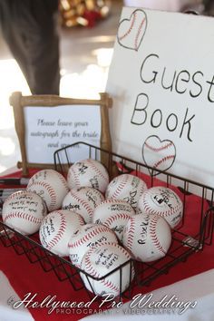 a basket filled with baseballs sitting on top of a table