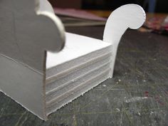 several pieces of white paper stacked on top of each other