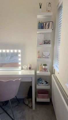 a white desk with a mirror and lights on it