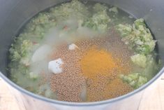 broccoli and other ingredients are mixed in a pot