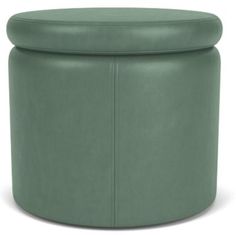 a large green ottoman that is sitting on the floor