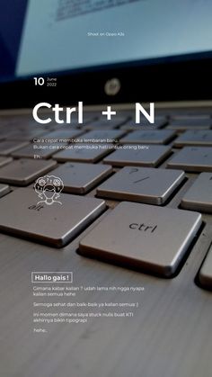 a close up of a laptop keyboard on a table with the caption ctrl + n