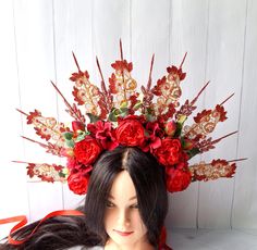 This wonderful red halo crown wedding will make you the center of a festival or wedding. Your friends will appreciate this Gold lace halo headpiece bridal. Crown spikes are made of wood spiked. Spikes are neatly glued to the metal headband that I wore with tape. Gold spikes are painted with gold paint.  The flower headdress is decorated with red roses and lace. Each flower is securely fastened with felt.  The height of the spiked is about 7.48 inches (19 cm). More of my spiked halo crown you can see here https://www.etsy.com/ru/shop/byIraFomina?ref=hdr_shop_menu§ion_id=26561099 Address to me on any question. I will be happy to help you. Halo Crown Wedding, Halo Headpiece, Flower Headdress, Halo Crown, Metal Headband, Headpiece Bridal, Wedding Gold, Crown Wedding, Bridal Flower