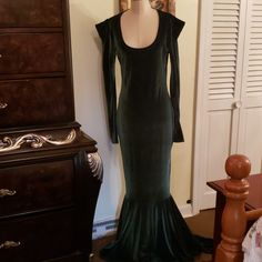 Gorgeous Stretch Velvet Gown Made By Croquet Clothing On Etsy. Never Worn. Sharp Shoulders. Long Sleeves. Low Round Neck. Small Train. Size 12. I Don't Have All The Exact Measurements But It Will Fit A Size 12 It's Stretchy. Elegant Green Gown For Costume Party, Fitted Velvet Gown For Evening, Fitted Long Evening Dress For Banquet, Green Fitted Velvet Evening Dress, Fitted Maxi Dress For Banquet, Fitted Long Maxi Dress For Prom, Fitted Long Sleeve Gown For Costume Party, Fitted Floor-length Velvet Evening Dress, Fitted Green Long Dress Gown