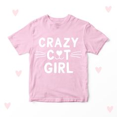 "Adorable hand made children's t-shirt reading \"Crazy Cat Girl\" The perfect gift for Cat Lover's, Girls that just love their Cats! Our Personalized T-shirts are made from 100% Cotton and professionally printed with heat transfer.  Machine washable, 40 degree wash. Do not bleach. Do not tumble dry. Do not dry clean. Warm iron. Available in Sizes: 6-12 Months 1-2 Years 2-3 Years 3-4 Years 4-5 Years 5-6 Years 6-7 Years 7-8 Years 8-9 Years 9-10 Years 10-11 Years 11-12 Years 12-13 Years All of our Cotton T-shirt With Cat Design For Gift, Cotton T-shirt With Cat Design As Gift, Lover Clothes, Girl T Shirt, Cat Girl, Crazy Cat, Personalized T Shirts, Clothes Gift, Kids Tops