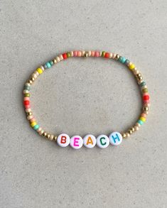 CUSTOM Name/Word Rainbow Bracelet Max. 12 Letter Beads (A-Z) - 3mm Mixed Beads - 7mm Letter Beads - Stretchy I can make the bracelet to your size.  Just send me a message or you will receive a standard size (18cm) bracelet. This listing is for one bracelet. Letter A, Friendship Bracelet, Word Bracelet, Rainbow Bracelet, Rainbow Beads, Letter Beads, Colorful Jewelry, Arm Band, Friendship Bracelets