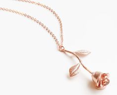 This standard single charm necklace is featured in rose gold tone and is available with a size 20" chain. Rose Gold Charm Necklace With Flower Pendant, Valentine's Day Rose Gold Necklaces With Rose Design, Rose Gold Flower Pendant Charm Necklace For Valentine's Day, Dainty Rose Gold Charm Necklace With Rose Design, Single Rose, Size 20, Charm Necklace, Gold Tones, Rose Gold