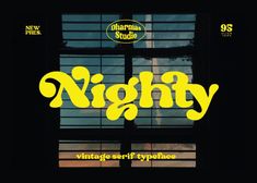 a window with the words nighty written in yellow on it's front and side