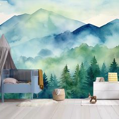 a baby's room with mountains and trees painted on the wall