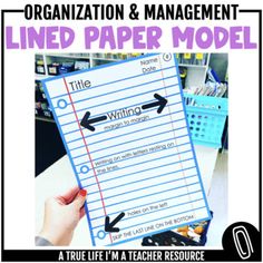 a hand holding a lined paper model with the words organization and management in black letters