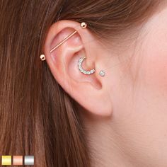 a woman with two piercings on her ear