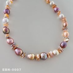 One picture corresponds to one product.  1 Strand 16 Inch Aurora Edison Baroque Pearl（Wrinkled skin） & Stacked Keshi Freshwater Pearl Necklace Pearl size: 10-13.5mm（Edison Baroque Pearl) Pearl color: Colorful Rainbow，high luster Holes:  go though I hope to provide high-quality services for your pearl jewelry design. Multicolor High Luster Necklaces As Gift, Multicolor High Luster Necklace For Gift, Multicolor High Luster Round Bead Jewelry, Multicolor High Luster Round Beaded Jewelry, Elegant Multicolor High Luster Necklaces, Elegant Handmade Multicolor Pearl Necklace, Elegant Multicolor Pearl Necklace Gift, Pearl Jewelry Design, Colourful Necklace