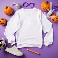 Featuring a flat lay white Gildan 18000 sweatshirt mockup looking all ready for your Halloween store !  This mockup template is perfect for anyone in the Print On Demand industry or looking for a simple and stylish lifestyle mockup. With this digital download, you'll have access to a high-quality image that'll be sure to make your shop stand out and sell those shirts! Don't wait, add this beautiful mockup to your collection today!  Available colors: White  Mockup Details:  Brand:  Gildan 18000 ATTN: Although most colors should match the mockups on Printify and Printful, there may be a few that are slightly off. If you encounter any issues with the color you want to use, please send me a message and I will work with you to find a solution.  This is an instant download with no physical item White Halloween Sweatshirt For Streetwear, White Long Sleeve Halloween Sweatshirt, White Long Sleeve Halloween T-shirt, White Long Sleeve T-shirt For Halloween, White Crew Neck Sweater For Halloween, Fall White Printed Sweatshirt, Casual White Sweatshirt For Halloween, Casual White Sweater For Halloween, White Halloween Hoodie Long Sleeve