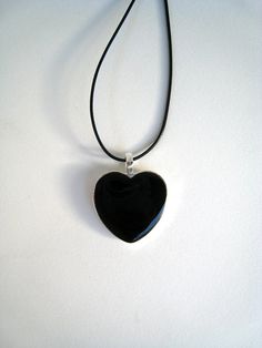 Black Heart necklace. Medium (1'') heart shaped pendant, silver plated. Custom color. Resin (liquid glass) Black Heart Charm Pendant Jewelry, Black Pendant Jewelry With Heart Charm, Minimalist Black Heart Charm Necklace, Minimalist Black Heart Necklace, Black Heart-shaped Jewelry, Black Jewelry With Heart Charm Pendant, Black Jewelry With Heart Charm, Minimalist Black Heart Pendant Necklace, Black Sterling Silver Jewelry With Heart Charm