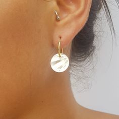 "Modern hoops hammered disc earrings. Each earring composed of two hammered discs- one gold and one silver, So you get two sets of earrings at the price of one 😉 You can even play with it and wear one with the gold disc in the front and one with the silver in the front 😃 Super lightweight, and dainty yet it has a nice matt-shiny gold \\silver presence. These hammered gold and silver disc earrings will be your new favorite piece. Perfect for everyday wear or for a special occasion. THE DETAILS: Hammered Open Circle Earrings For Everyday, Minimalist Hammered Round Disc Earrings, Dainty Small Hoop Hammered Earrings, Dainty Hammered Round Hoop Earrings, Minimalist Hammered Round Hoop Earrings, Minimalist Hammered Circle Earrings, Round Dangle Earrings, Earrings Double, Gold Disc