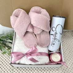 pink slippers and candle in a gift box