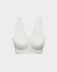 Pearl Bralette Elegant Full Coverage Nursing Bra With Soft Touch, Modern Stretch Sports Bra With Built-in Bra, Solid Sculpting Bra With Built-in Support, Solid Color Low-cut Sports Bra With Removable Pads, Compressive White Bra, White Compressive Bra, White Compressive Fit Bra, Everyday Seamless Underwire Bra, Bra With Removable Pads And Minimal Stretch