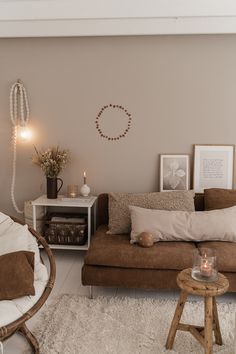 a living room filled with furniture and pillows on top of a white carpeted floor