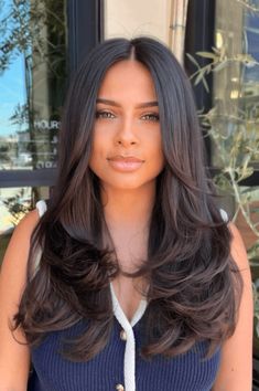 blowout hairstyles, effortless glamour, irresistible Hairstyles With Blowout, Blowout Flipped Ends, Long Layered Blowout Hair, Blowout Hair Dark Hair, Haircut For Blowout, Types Of Blowouts, Big Curls Blowout, Medium Brown Hair Layers, Blowout On Natural Curly Hair