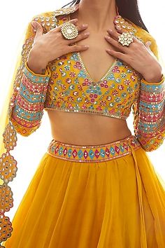 Lehenga Designs Yellow, Haldi Lehenga Blouse Design, Lehenga Designs Haldi, Festive Yellow Lehenga With Long Sleeves, Navratri Yellow Embellished Lehenga, Mustard Lehenga, Mirror Lehenga, Vani Vats, Applique Blouse