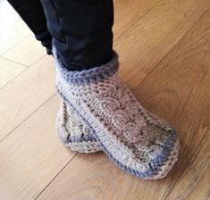 A beautiful pair of women's boot/knitted slippers. Made of 100 % wool yarn they are warm, cozy to wear and have a lot of bulk for extra comfort. Soles are covered with latex, which makes them not slippery to walk and give it a long life. Colors in picture - beige, grey. To make a slippers takes 3-5 days. If you want any other colors, please contact me. CARE: gently handwash in warm water, using a wool detergent. Reshape and let it dry. You will enjoy wearing wonderful warm slippers Cozy Hand Knitted Slippers With Round Toe, Cozy Hand-knitted Slippers With Round Toe, Cozy Hand-knitted Round Toe Slippers, Cozy Knitted Slippers With Round Toe, Hand Knitted Round Toe Slippers For Winter, Hand Knitted Round Toe Winter Slippers, Hand-knitted Round Toe Winter Slippers, Gray Closed Toe Slippers For Winter, Cozy Gray Slippers With Round Toe