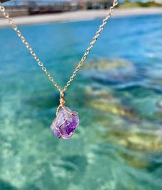 A beautiful and powerful stone, amethyst has become a very well known stone for crystal beginners and novices.  This amethyst will be wire wrapped in tarnish resistant wire and made especially for you by me! ❤️ Each crystal is similar In size and color- however no one crystal is the same.  The pendant is on a a dainty 18k gold plated chain! Hand Wrapped Purple Crystal Necklace For Gifts, Purple Hand Wrapped Crystal Necklaces For Healing, Hand Wrapped Amethyst Crystal Necklace For Gift, Purple Natural Stones Crystal Necklace For Healing, Purple Mystical Crystal Necklaces For Jewelry Making, Mystical Purple Necklaces With Natural Stones, Lavender Amethyst Necklaces For Healing, Crystal Beginners, Purple Amethyst Crystal Necklaces With Natural Stones